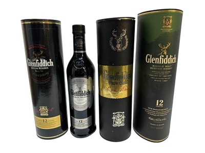 Lot 273 - Four bottles, Glenfiddich Pure Malt Whisky, 70% proof, 26 2/3 fl.oz., Glenfiddich 12 years old, another 12 years old and Glenfiddich Caoran Reserve single malt, three in original card tubes