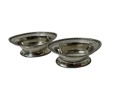 Lot 45 - Pair of George V silver salts of navette form with pierced borders, on oval feet with beaded borders (Birmingham 1913), 8cm x 5.5cm, 2ozs