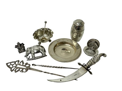 Lot 55 - Edwardian silver place name holder, silver armada dish, pepperette, miniature silver letter opener in the form of a dagger and other items, 4ozs of weighable silver