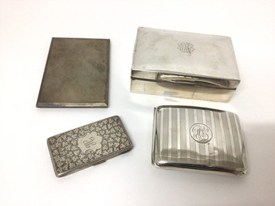 Lot 68 - Four silver cigarette cases and a silver cigarette box