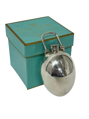 Lot 131 - Unusual Victorian silver egg-shaped flask with screw top and swing handle, English hallmarks (rubbed) and retailers marks ' Love, 35 Boul.d Des Capucines, Paris' 13cm high