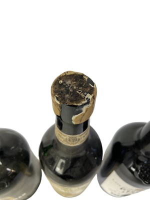 Lot 298 - Five bottles, Sandeman Port 1989, another Ruby, two bottles lacking labels and a bottle of Sandeman Olorosso Sherry