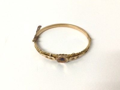 Lot 128 - Late Victorian 15ct gold sapphire and diamond hinged bangle