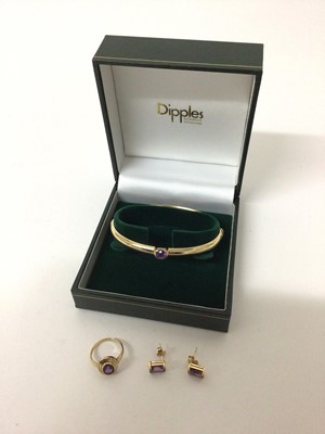 Lot 166 - 9ct gold and amethyst hinged bangle, earring and ring