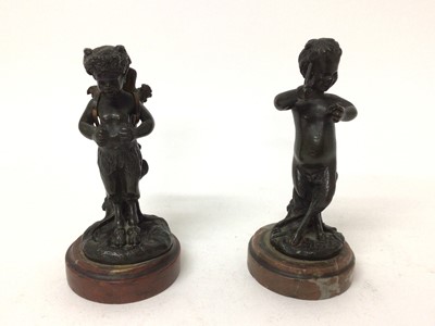Lot 524 - After Clodion, two 19th century bronze studies of classical fawns, signed on rouge marble bases, approx 15cm high