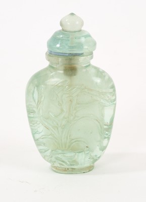 Lot 893 - Well carved Chinese rock crystal snuff bottle