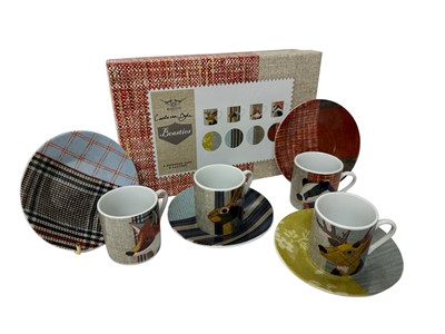 Lot 70 - Set of four modern Carola van Dyke espresso cups and saucers from the 'Beasties' series, in fitted box