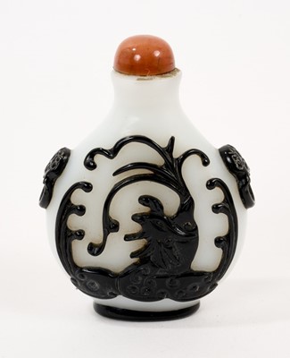 Lot 899 - 18th/19th century black overlay glass snuff, decorated with carp