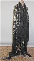 Lot 3113 - Black Chinese silk piano shawl with cream...