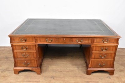 Lot 1347 - Twin pedestal partners’ desk with green leather top