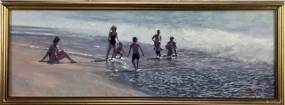 Lot 207 - Peter Z. Phillips, oil on canvas - A beach scene with a family playing in the surf, signed, in gilt frame. 20 x 60cm.