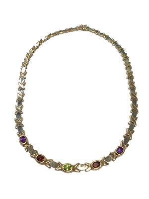 Lot 90 - 9ct yellow and white gold cross and oval link necklace set with five multi-coloured gem stones, 41cm long