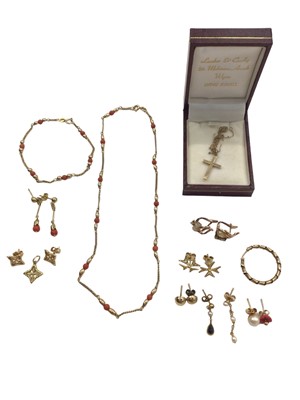 Lot 1007 - 9ct gold and coral bead chain necklace, matching bracelet and pair of earrings, together with a 9ct gold cross pendant and a group of 9ct gold and yellow metal earrings