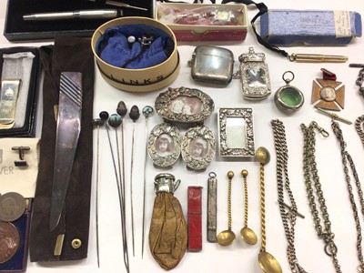 Lot 1030 - Two silver watch chains, other chains, hat pins including Charles Horner, silver pencil holder, plated vesta cases, miniature photograph frames, "Midget" gold plated pen and other items