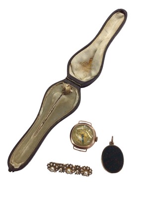 Lot 1014 - Edwardian seed pearl triple flower head brooch, Victorian 12ct gold oval locket with bloodstone panel, vintage 9ct rose gold watch and a yellow metal stick pin in antique box