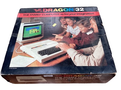 Lot 2411 - 1970s Dragon 32 Family computer in original box together with a suitcase of accessories to include Sinclair ZX81etc
