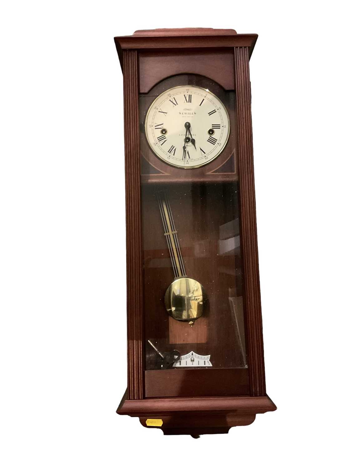 Lot 217 - Sewills hanging wall clock with Westminster chiming movement