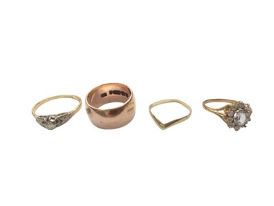 Lot 1024 - 18ct gold diamond single stone ring, 9ct rose gold thick band wedding ring, one other 9ct gold ring and 9ct gold gem set cluster ring (4)