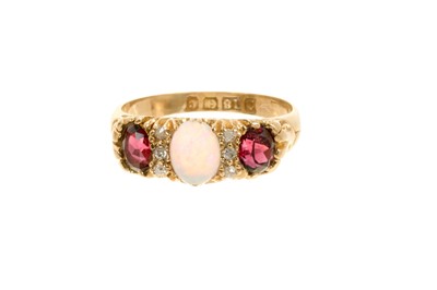 Lot 600 - Edwardian 18ct gold opal, garnet and diamond ring