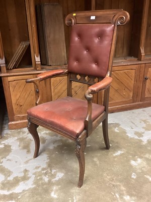 Lot 1202 - Regency Gothic influence mahogany elbow chair with high back, red leather buttoned upholstery on splayed legs