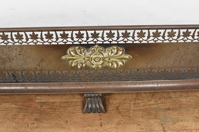 Lot 1464 - Regency steel fire curb with classical brass mounts and pierced decoration