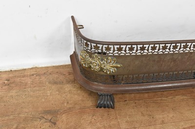 Lot 1464 - Regency steel fire curb with classical brass mounts and pierced decoration