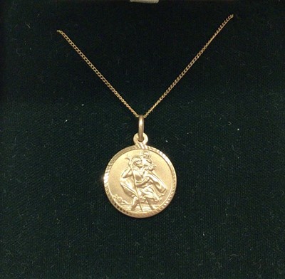 Lot 1032 - 9ct gold St. Christopher pendant on 9ct gold chain, boxed