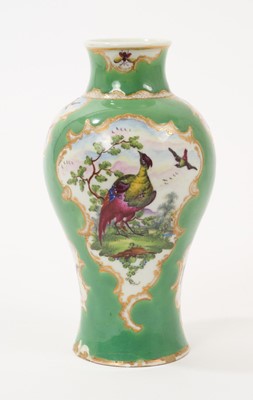 Lot 175 - Worcester green ground vase, painted with exotic birds