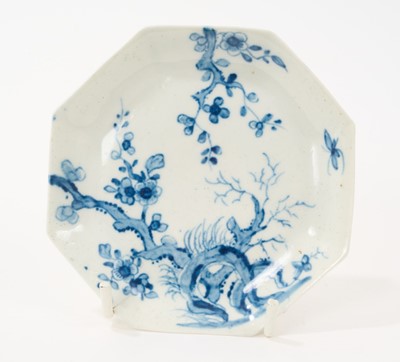 Lot 57 - Worcester octagonal saucer, painted in blue with the Prunus Root pattern, circa 1755, workman’s mark Provenance; Watney Collection and Zorensky Collection