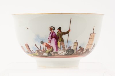 Lot 168 - Meissen tea bowl, painted in coloured enamels with figures and shipping in a continuous estuary landscape, the interior unusually painted in purple monochrome with figures in a harbour scene, circa...