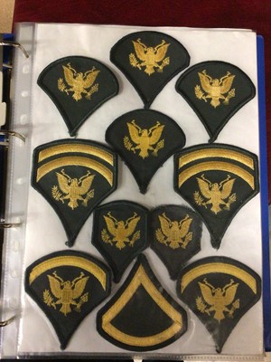 Lot 193 - Blue folder of US military cloth badges (approx 80)