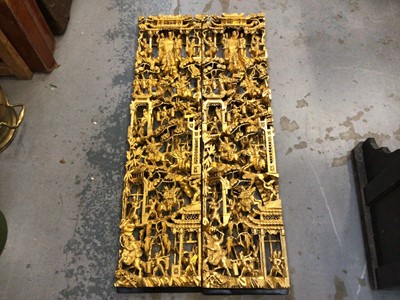 Lot 654 - Pair of Oriental gilded carved wood panels