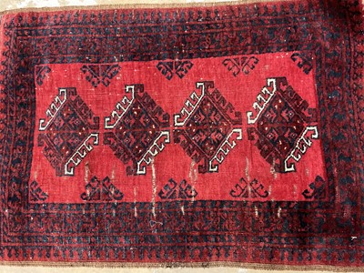 Lot 1387 - Bokhara rug and two Persian wool pile rugs (3)