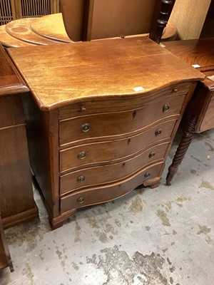 Lot 1229 - Old Mahogany serpentine small chest of four long drawers with brushing slide on ogee bracket feet 72 cm wide, 74cm high, 47.5cm deep