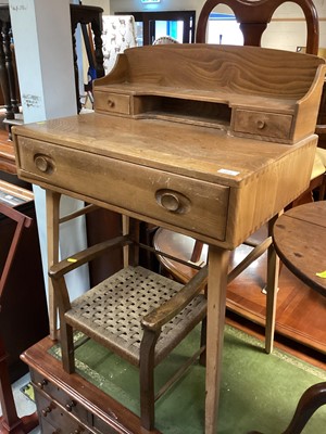 Lot 1272 - Ercol elm writing table