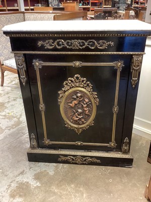 Lot 1232 - 19th century French ebonised and gilt metal mounted pier cabinet with marble top and cherub decoration 86 cm wide, 106 cm high, 41cm deep