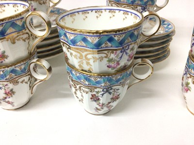 Lot 137 - Minton blue ribbon and pink rose swag pattern tea set, comprising of 18 saucers, 11 tea cups, 6 coffee cups and one jug