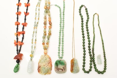 Lot 644 - Collection of Chinese jade/green hardstone jewellery