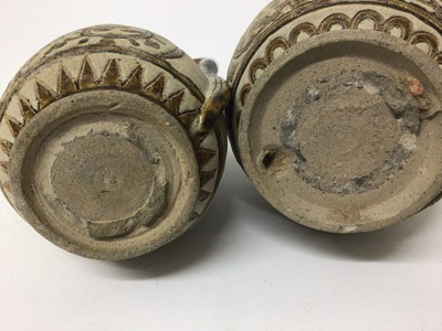 Lot 135 - Antique Thai Sawankhalok ewer and base warmer both with incised designs