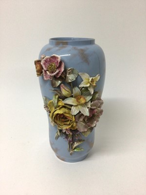 Lot 142 - Large antique Doulton floral encrusted vase on blue ground, dated 1879