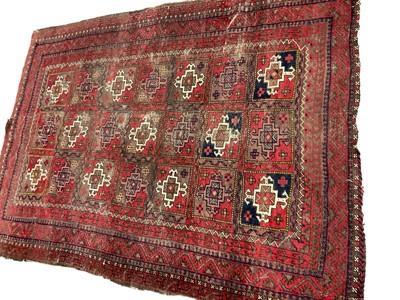 Lot 1381 - Rug with geometric pattern on red and blue ground