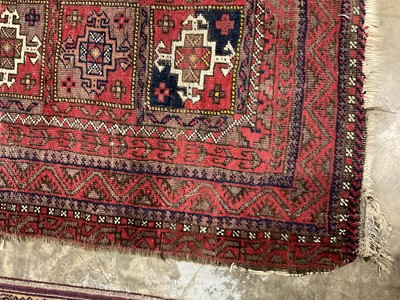 Lot 1381 - Rug with geometric pattern on red and blue ground