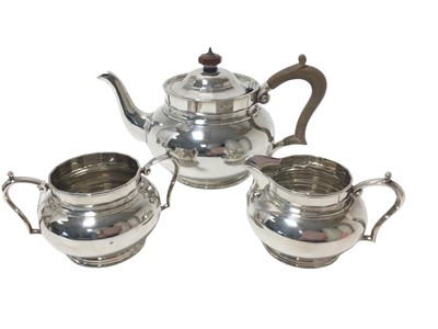 Lot 250 - 1930s silver three piece tea set