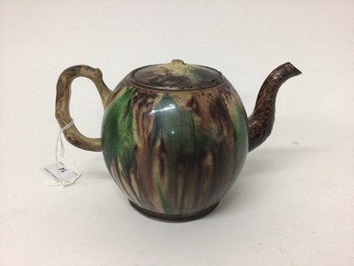 Lot 14 - Mid 18th century Whieldon ware globe shape teapot