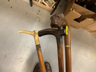 Lot 472 - Late Victorian novelty walking stick in the form of a bull dog with opening mouth, plus two other walking sticks (3)