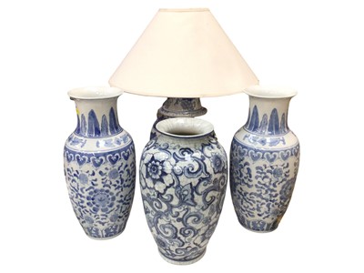 Lot 329 - Pair of decorative blue and white vases, one other and a similar lamp (4)