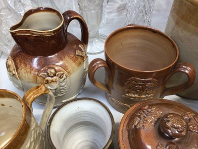 Lot 312 - Collection of 19th century and later stone ware jugs, jars, tankards, bowsl, a flagon and a tyg