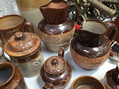 Lot 312 - Collection of 19th century and later stone ware jugs, jars, tankards, bowsl, a flagon and a tyg