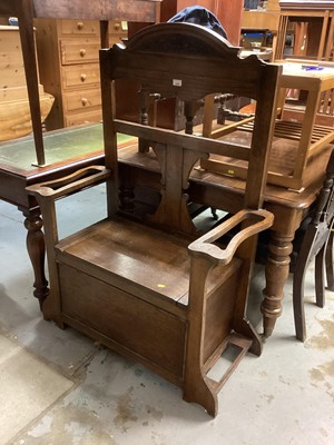 Lot 1266 - Edwardian carved oak hall bench/ umbrella stand with rising seat