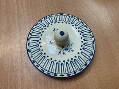 Lot 140 - Wedgwood Queensware small teapot and cover, painted in bright blue enamel with military trophies, circa 1815-20